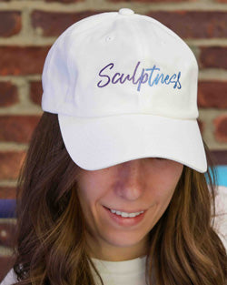 Ashley Brooke wearing Sculptness White Baseball Cap