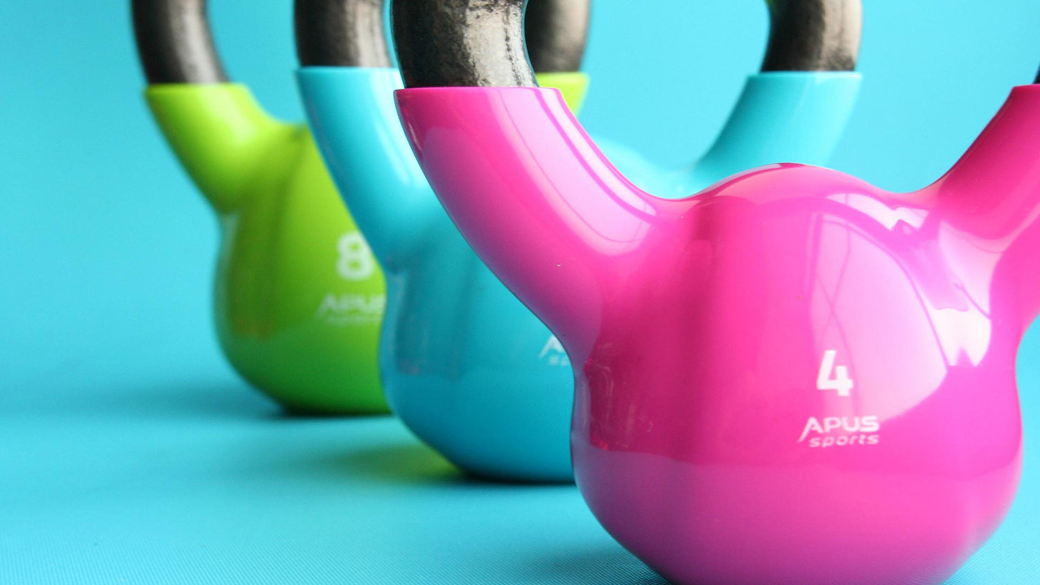 Sculptness Cover Photo of Colorful Kettlebells